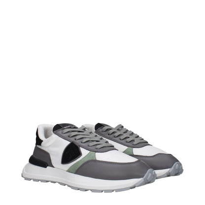 Philippe Model White Fabric Low Top Sneakers with front and back logo and vintage effect design.