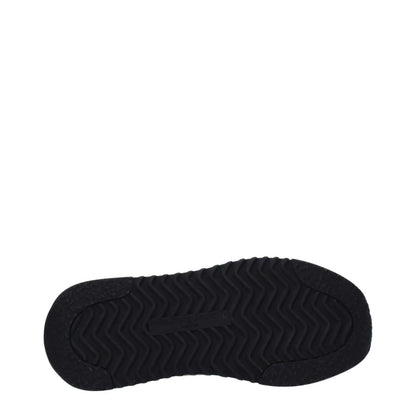 Philippe Model Beige Fabric Low Top Sneakers sole view showcasing black textured design for grip and comfort.