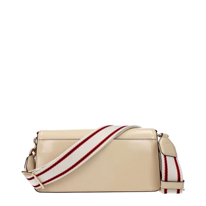 Tory Burch Beige Leather Crossbody Bag with adjustable striped strap and divider inner pocket, back view.