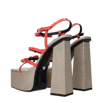 Versace Orange Leather Platform Sandals with patent finish and front logo, featuring high block heels and adjustable straps.
