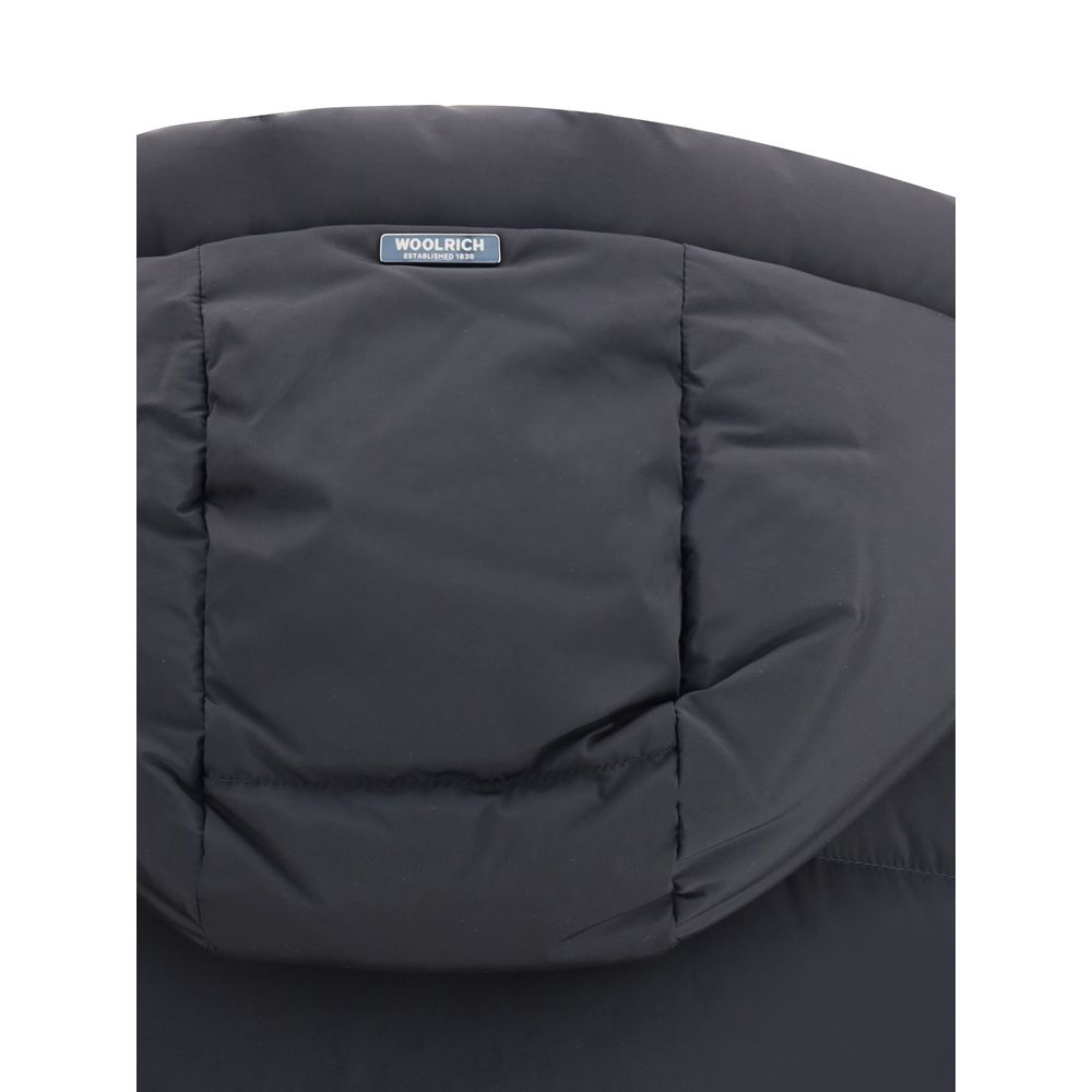 Close-up of Woolrich Black Goose Down Coat hood showcasing quality quilting and design.