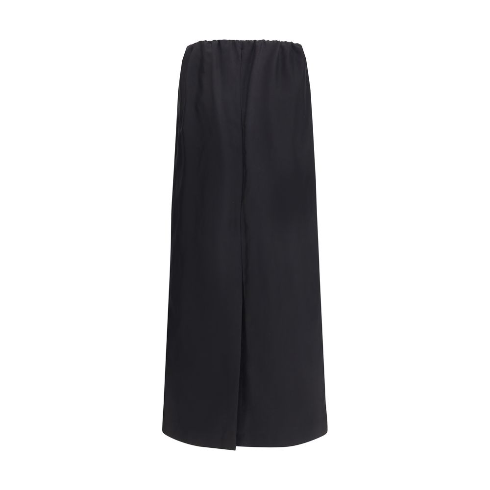 The Row Black Cotton Midi Skirt in minimalist style with elastic waist, crafted from cotton-silk voile for timeless elegance.