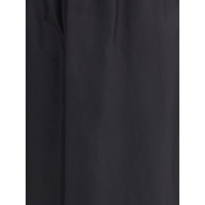 Close-up of The Row Black Cotton Midi Skirt, showcasing minimalist style and cotton-silk voile fabric in black with a slightly flared fit.