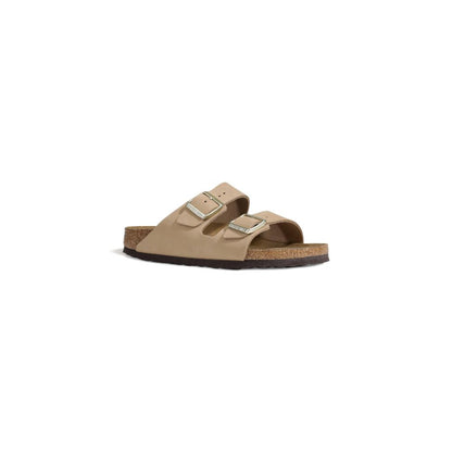 Birkenstock Beige Nubuc Leather Slippers with adjustable straps and cork footbed, side view.