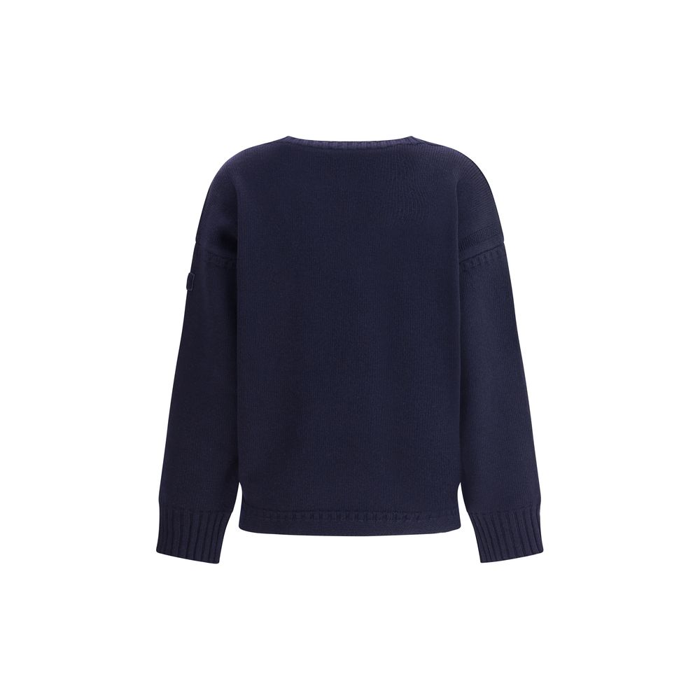 Back view of Chloé Blue Wool Sweatshirt featuring ribbed cuffs and hem in a luxurious oversized design.