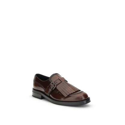 Church's Brown Calf Leather Bos Taurus Oxfords And Derbies with fringe and buckle detailing, made in Italy, block heel, round toe.