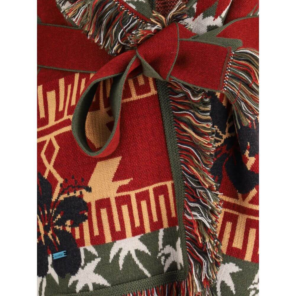 Close-up of Alanui Multicolor Fleece Wool Cardigan with hibiscus and palm designs, showcasing fringed edges and sash belt.