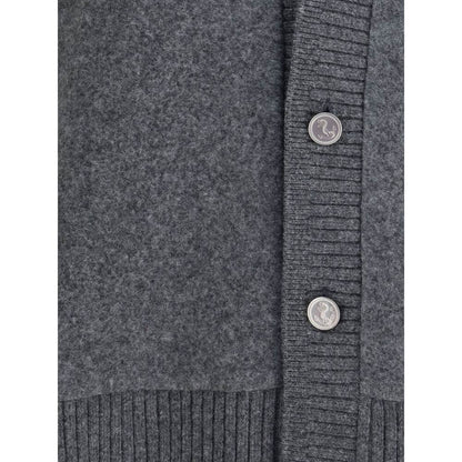 Close-up of Thom Browne Gray Wool Cardigan showing button detail and ribbed hem.