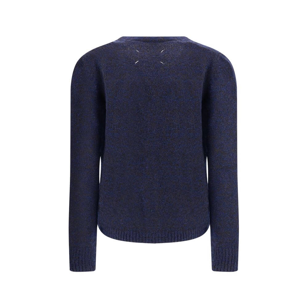 Margiela Blue Wool Cardigan with ribbed edges and signature back stitches, showcasing minimalist design and refined texture.