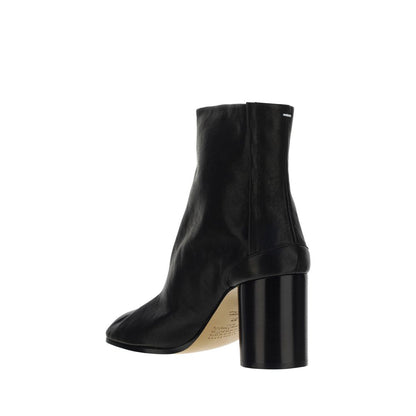 Side view of Margiela Black Lamb Ovis Aries Aries Ankle Boots with cylindrical heel and split toe design, iconic avant-garde style.