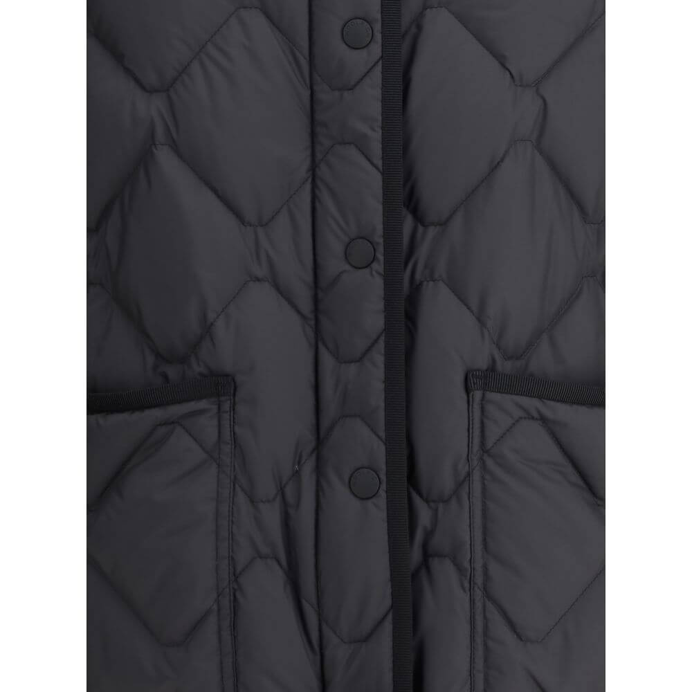 Close-up of Woolrich Black Polyester Clothing Heritage Down Jacket with front snap closure and patch pockets