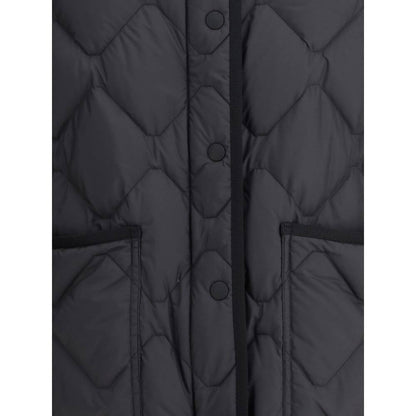 Close-up of Woolrich Black Polyester Clothing Heritage Down Jacket with front snap closure and patch pockets