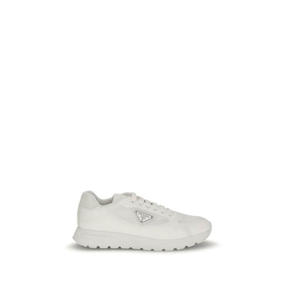 Prada White Rubber Athletic Sneakers with enameled triangle logo on white background.