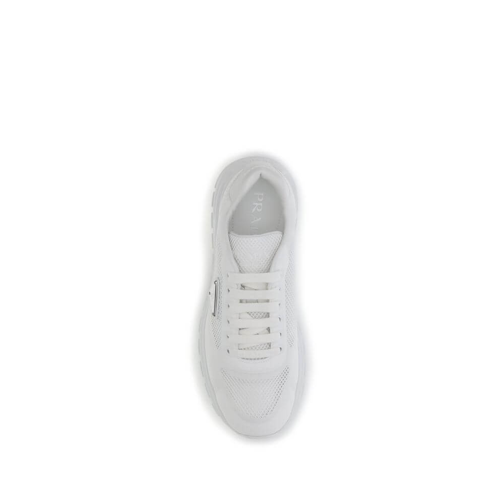 Top view of Prada White Rubber Athletic Sneakers featuring technical fabric and mesh design for comfort and urban style.