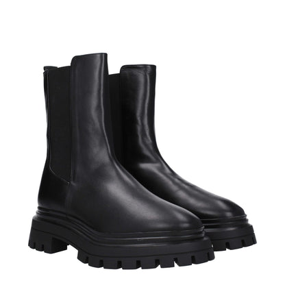 Stuart Weitzman Black Leather Ankle Boots with rubber sole and round toe, featuring back logo. MPN: BEDFORDCHISC754BLACK, code: F79017.