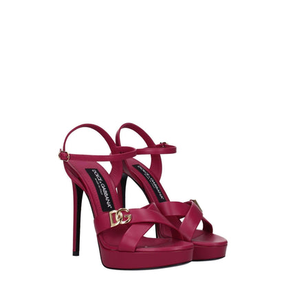Dolce & Gabbana Pink Leather Platform Sandals with high heel, open toe, buckle closure, and gold logo detail.