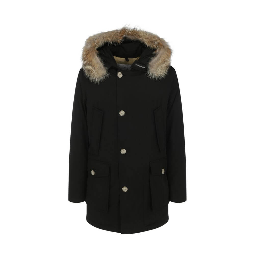 Woolrich Black Cotton Parka with fur hood, front pockets, and invisible zip closure, ideal for AW25 season, made in Bulgaria.