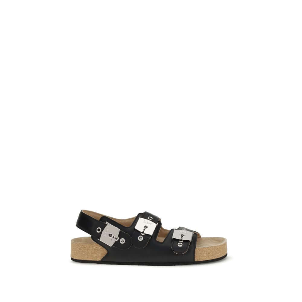 Balenciaga Black Calf Leather Bos Taurus Flat Sandals with adjustable straps and metal buckles, featuring ergonomic insole and cork-lined sole.