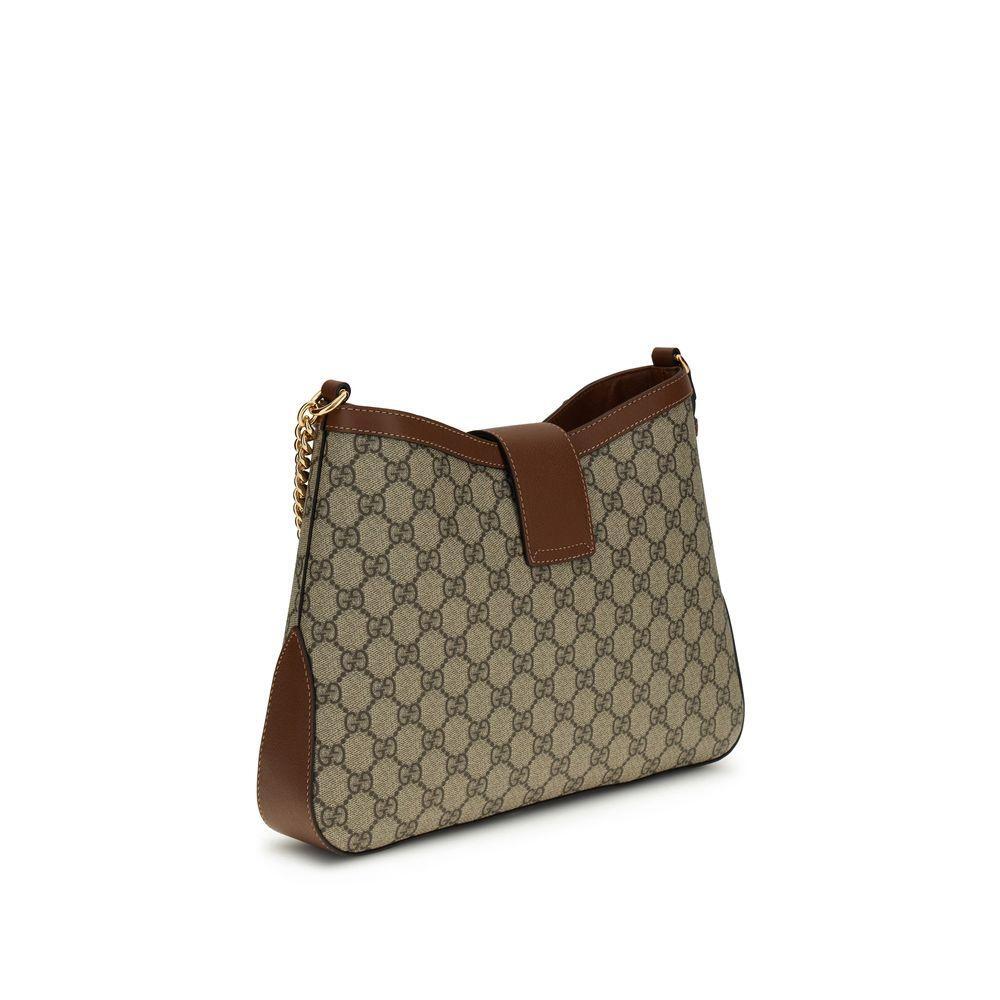 Front view with bag zipped and handles upright.