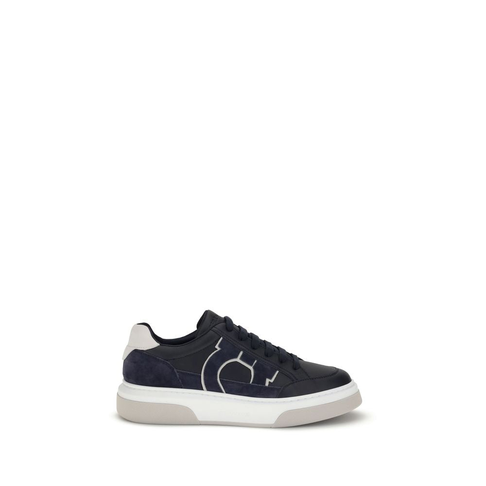 Ferragamo Blue Calf Leather Bos Taurus Low Top Sneakers with Gancini detail and textured rubber sole.