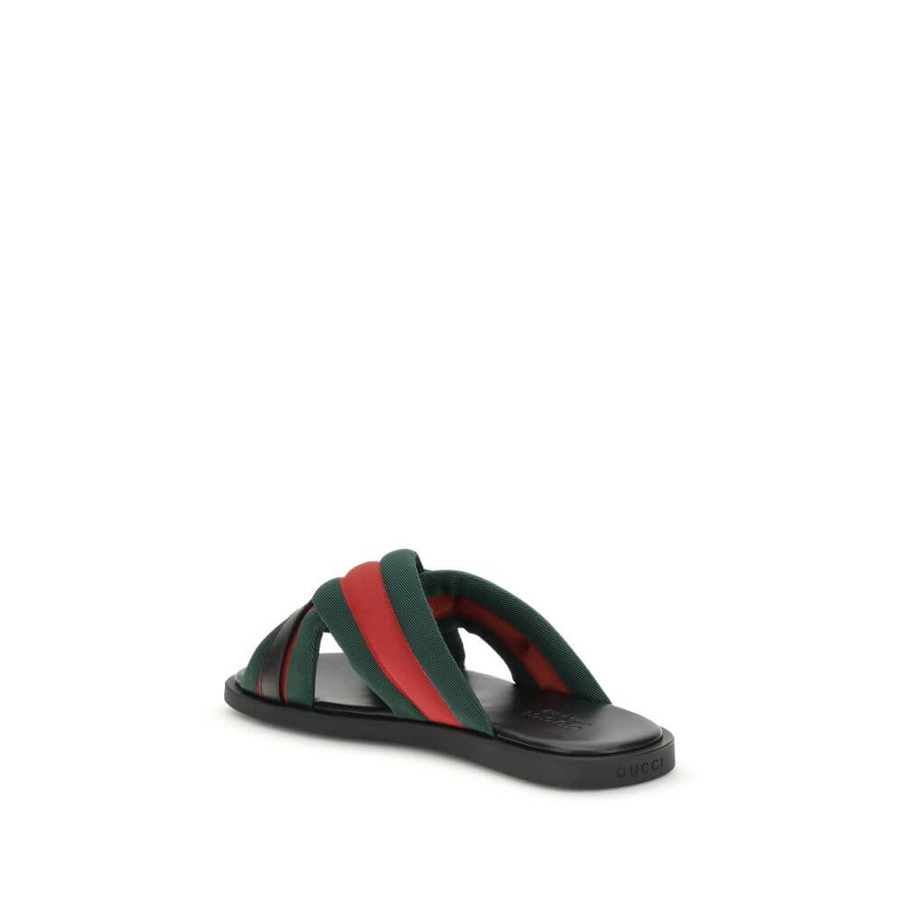 Gucci Black Polyamide Flat Sandals featuring iconic green and red Web fabric with silver-tone Interlocking GG logo, AW25 collection.