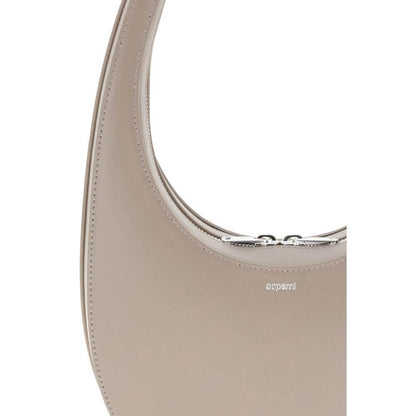 Close-up of Coperni Beige Leather Shoulder Bag with unique hobo silhouette and top two-way zip closure.