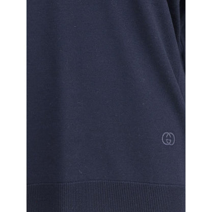 Gucci Blue Wool Sweatshirt showcasing tone-on-tone embroidered logo, ribbed hem, and classic design elements for a chic autumn style.