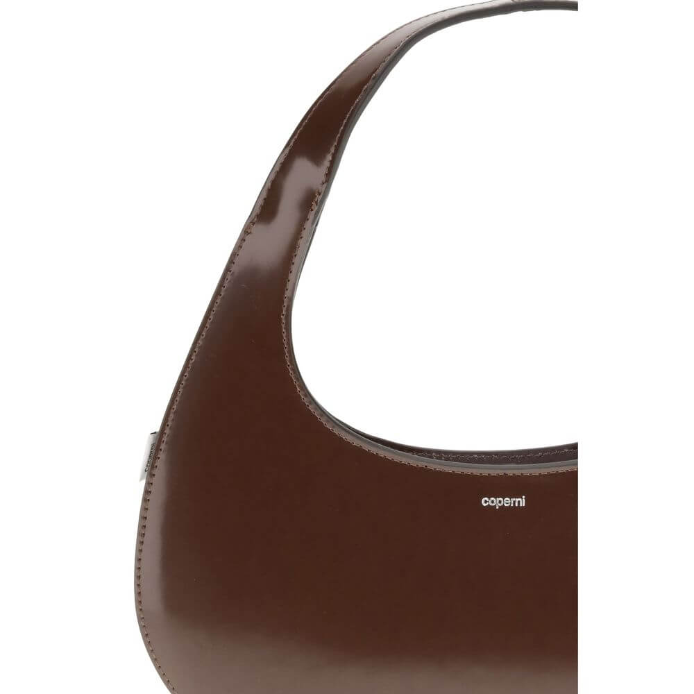 Coperni Brown Leather Shoulder Bag with sleek, curved design and smooth matte finish, crafted for elegance and everyday wear.