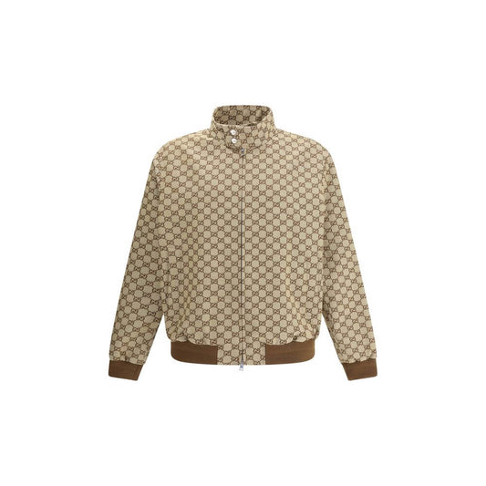 Gucci Beige Cotton Shell Jacket with GG Supreme pattern, high collar, snap buttons, and side pockets - AW25 collection.