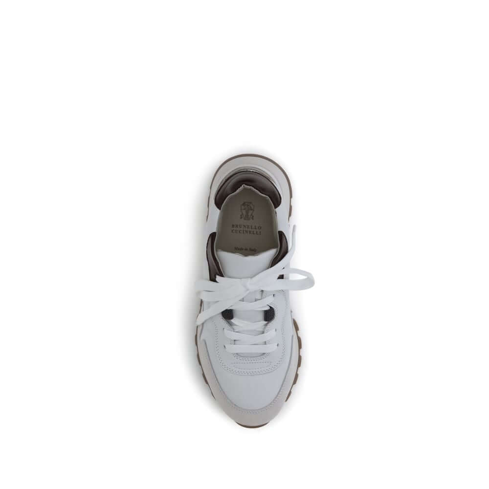 Top view of Brunello Cucinelli White Leather Athletic Sneakers with shiny details and flat cotton laces.