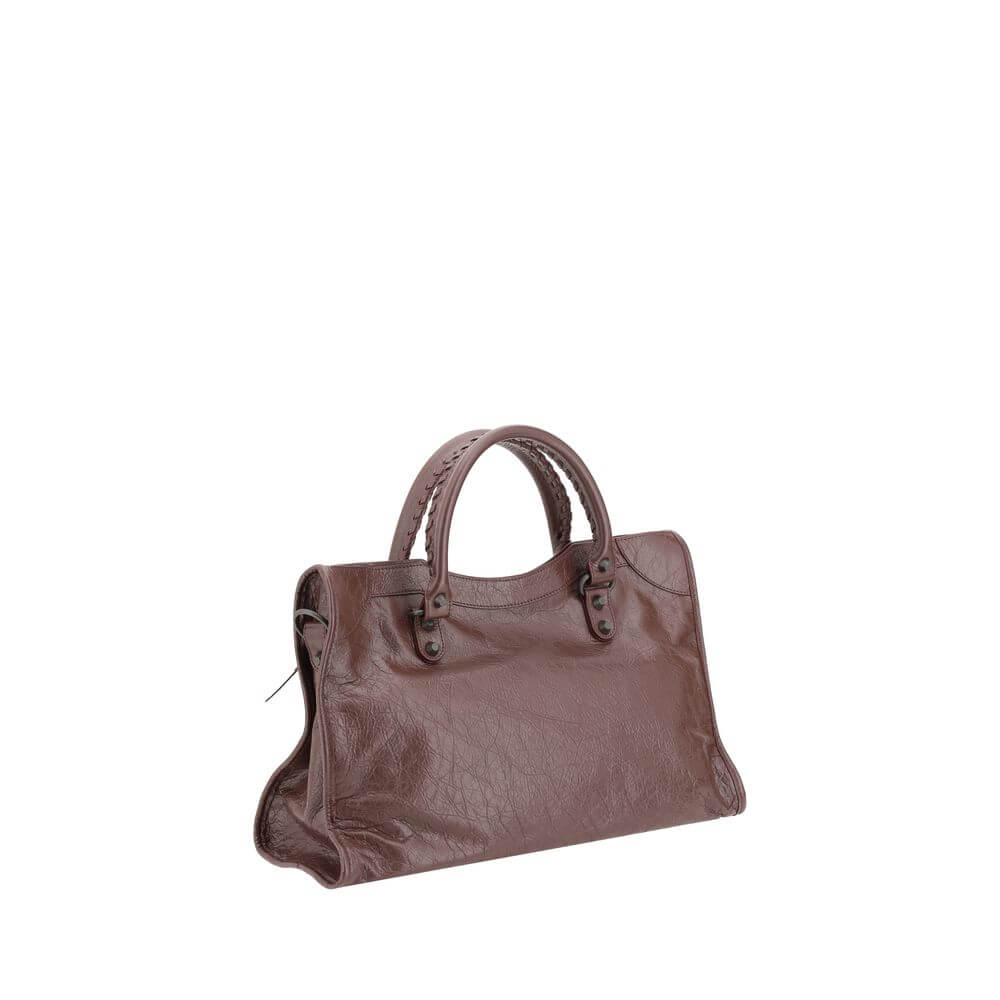 Balenciaga Brown Calf Leather Bos Taurus Shoulder Bag with hand-woven handles and adjustable strap.
