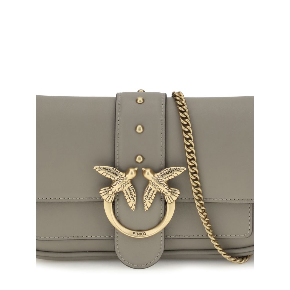 Front view with bag zipped and handles upright.