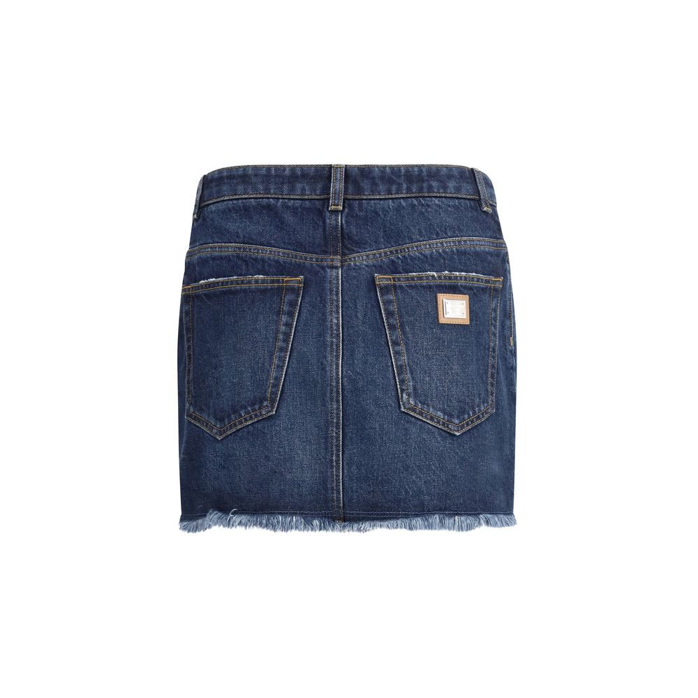 Dolce & Gabbana Blue Cotton Mini Skirt with frayed hem, back logo plaque, and classic five-pocket design.
