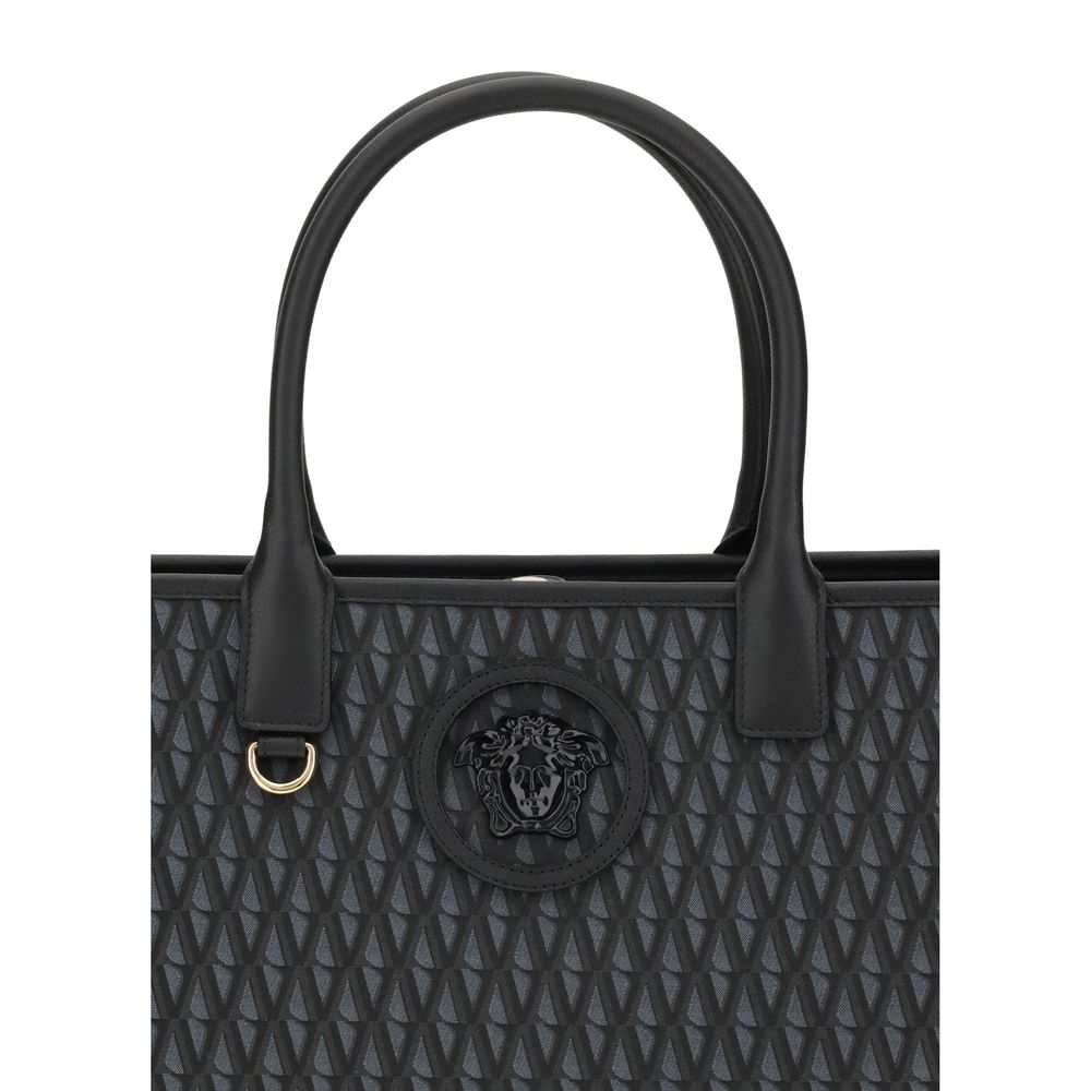 Front view with bag zipped and handles upright.