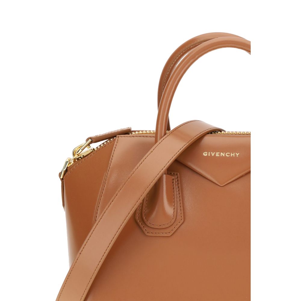Givenchy Brown Calf Leather Bos Taurus Handbag with glossy finish, featuring round handles and removable shoulder strap.