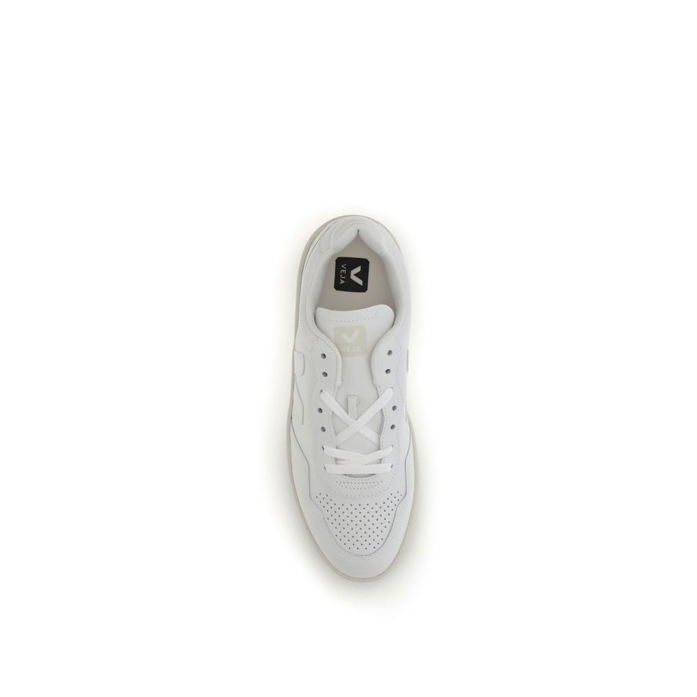 Veja White Leather Low Top Sneakers with lace-up closure and V logo, viewed from above, showcasing minimalist and sophisticated design.
