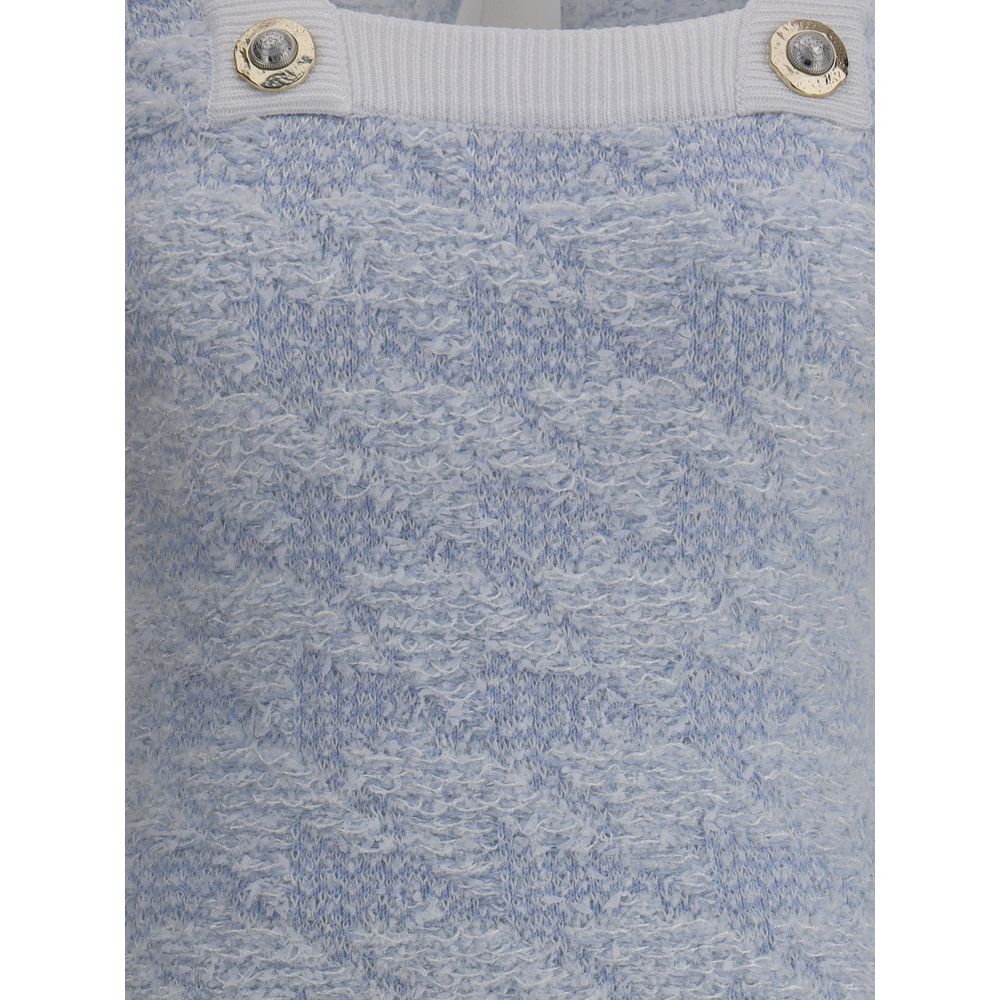 Balmain Light Blue Polyamide Casual Dress with embossed button details on ribbed neckline, showcasing style and elegance in close-up view.