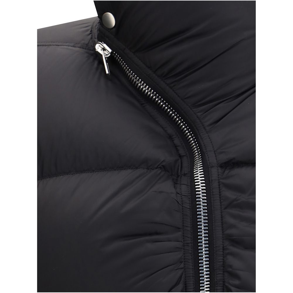 Close-up of Rick Owens Black Polyamide Jackets And Coat with high collar and zipper, showcasing its quilted design and urban style.