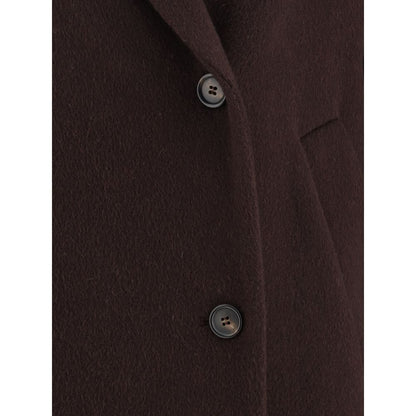 Brunello Cucinelli Bordeaux Cashmere Coat showing double-breasted button closure and side welt pocket detail for sophistication and elegance.