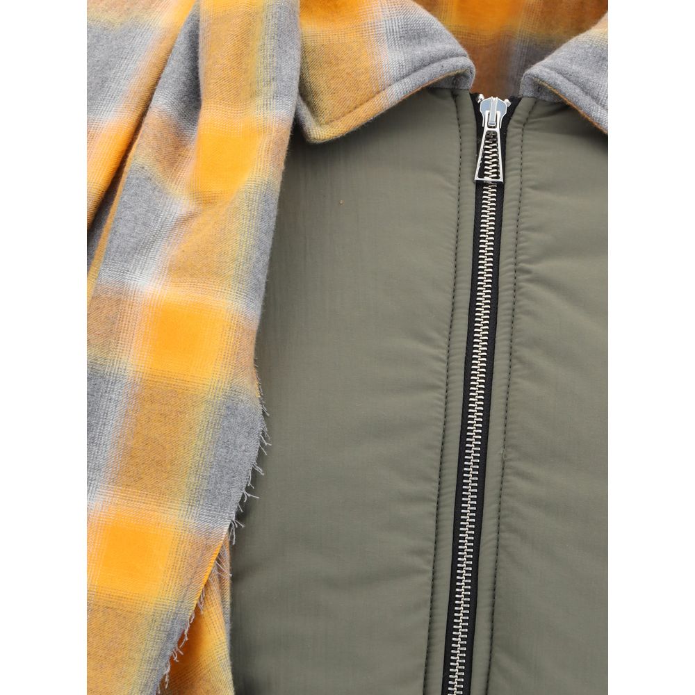 Close-up of MARBELL Green Cotton Coat with plaid maxi scarf, quilted down, front zip closure, and long sleeves for AW25 season.