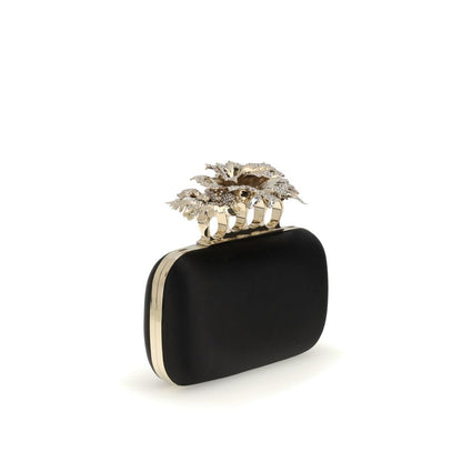 Alexander McQueen Black Silk Clutch Bag with crystal-encrusted carnation and gold chain, elegant accessory, AW25 collection.