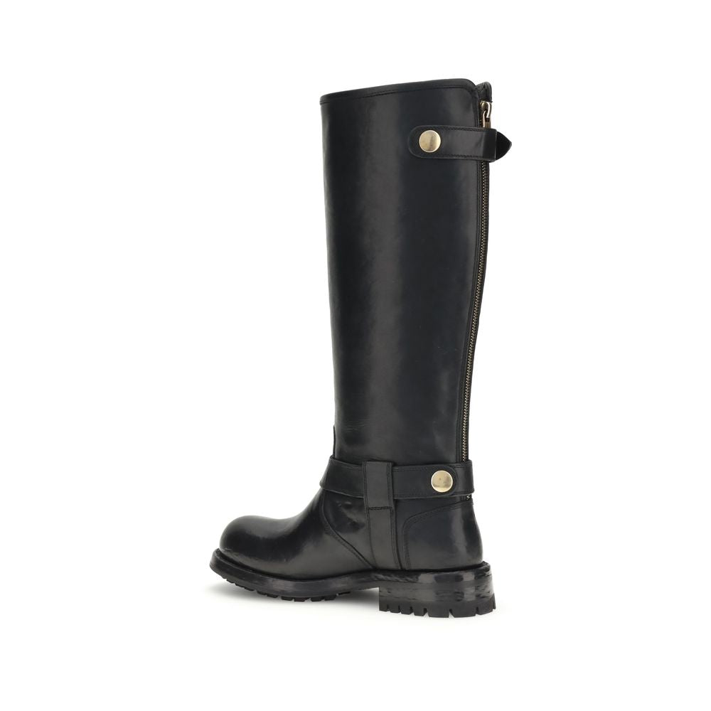 Dolce & Gabbana Black Calf Leather Bos Taurus Lace-Up Boots with buckle detail and durable TPU sole, side view.