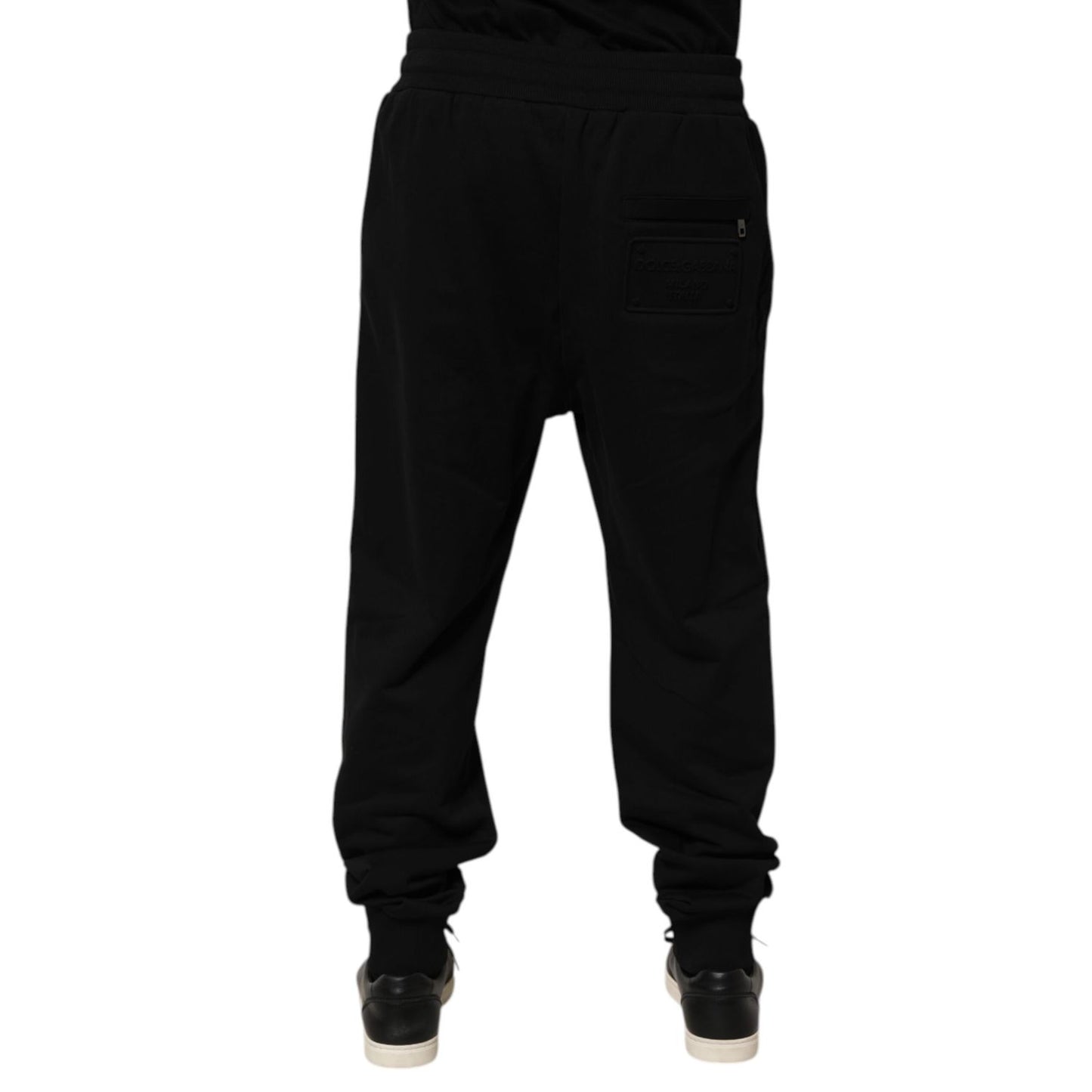 Dolce & Gabbana Black Cotton Drawstring Logo Sweatpants Pants rear view with logo patch on the back pocket, luxury casualwear.