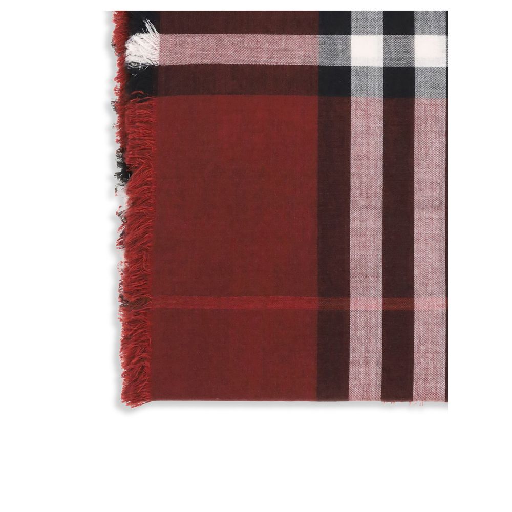 Burberry Red Wool Scarf featuring reversible check pattern in oxblood and post red shades with fringed edges, 52% wool, 48% silk.