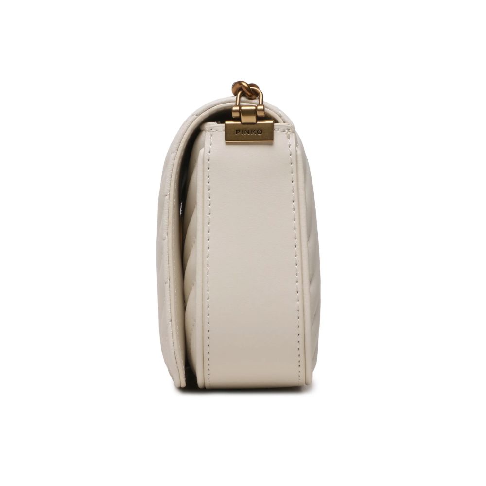 Front view with bag zipped and handles upright.