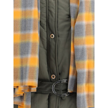 Close-up of MARBELL Green Polyamide Shell Jacket with quilted design, yellow plaid scarf, and faux-leather belt detailing.