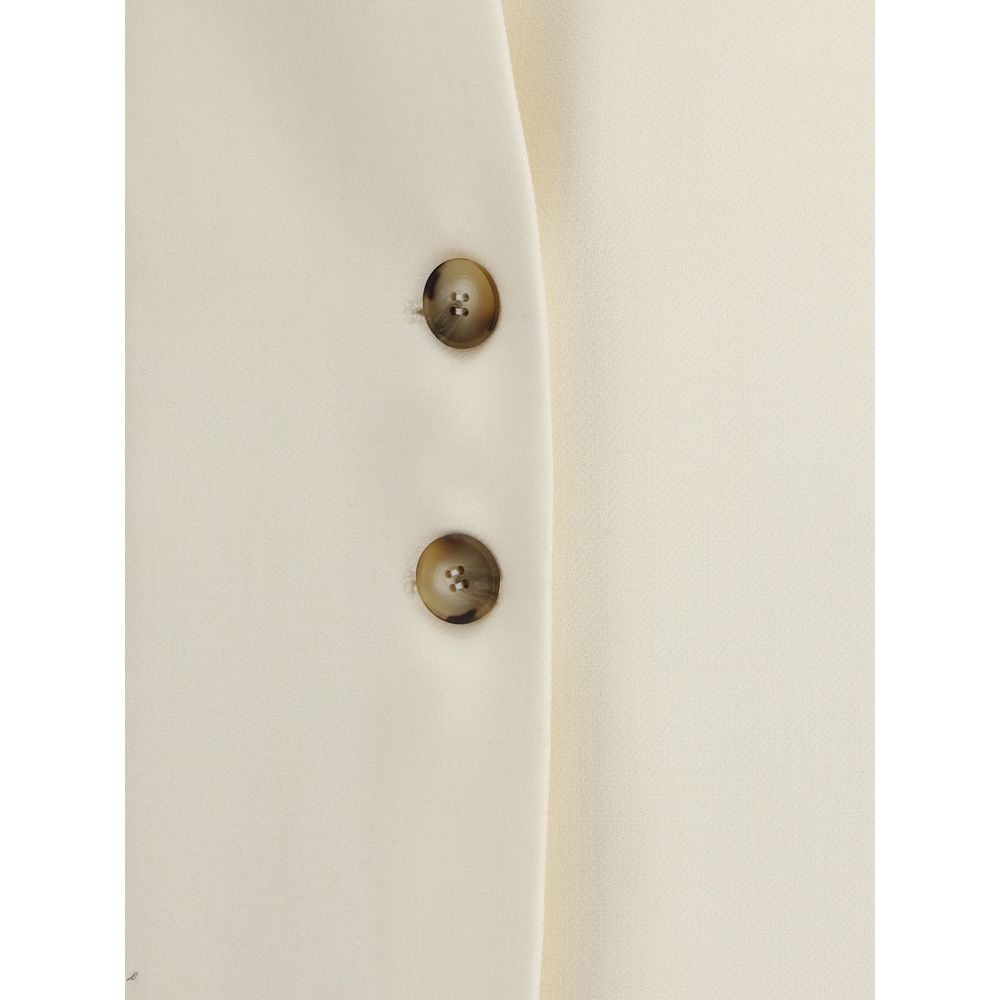 Close-up of button details on Di Stavnitser White Fleece Wool Coat, elegant and structured design with refined button accents.