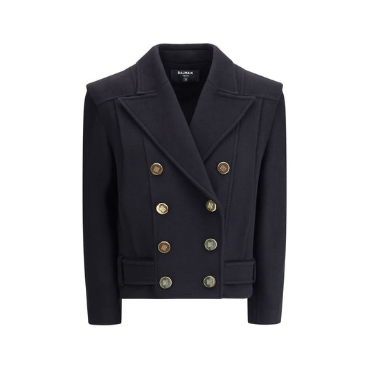 Balmain Black Wool Coat with gold buttons, double-breasted style, broad shoulders, and wide lapels showcasing elegant urban sophistication.