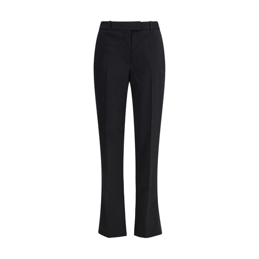Alexander McQueen Black Wool Dress Pants with pleated tapered leg and elegant tailoring, Autumn Winter 25 collection.