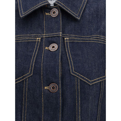Close-up of Alexander McQueen Blue Cotton Denim Jacket with contrast stitching, pointed shoulders, and front button closure, AW25.
